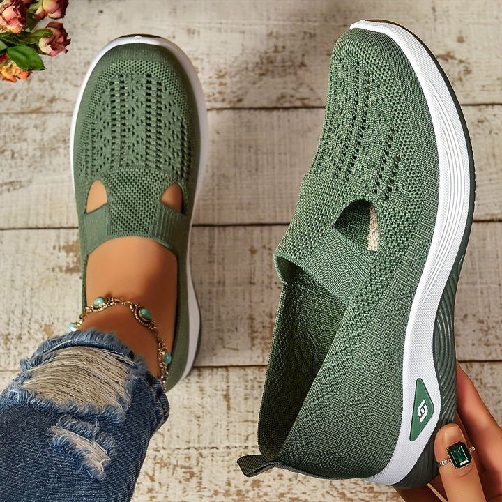Close-up of ergonomic women's comfort shoes with foot support, ideal for walking.