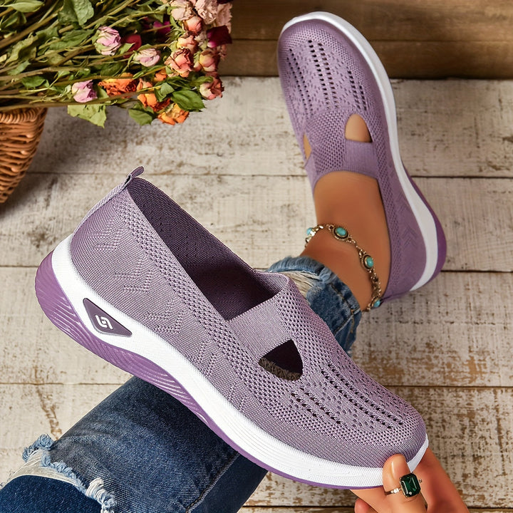 Women's beige comfort shoes with ergonomic foot support, great for long walks.
