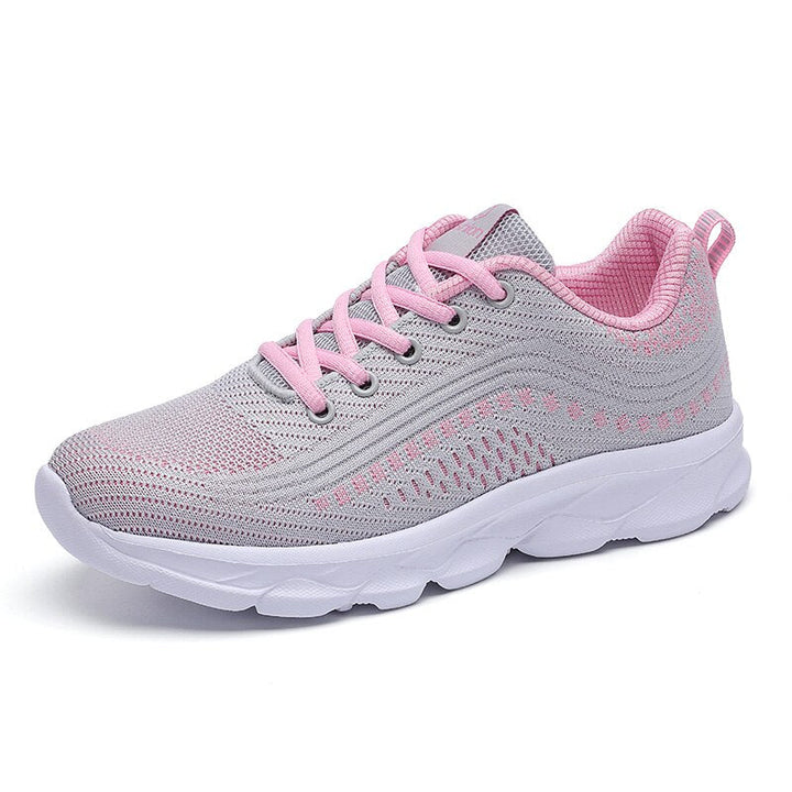 Comfortable women's sneakers with ergonomic design, arch support & breathable mesh for daily walks.