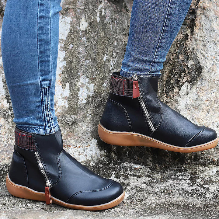Stylish women's orthopedic ankle boots with zipper closure & slip-resistant sole, ideal for fall/winter comfort.