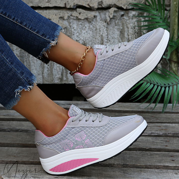 Casual women's orthopedic sneakers with superior arch support & comfort for daily wear & pain relief.
