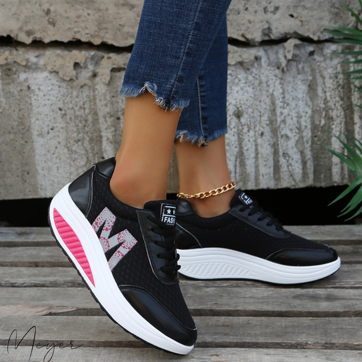 Stylish women's supportive sneakers, offering comfort & arch support for active lifestyles & all-day relief.