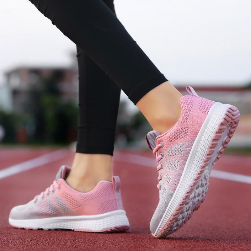 Orthopedic women's walking shoes, non-slip sole, breathable upper & supportive design.