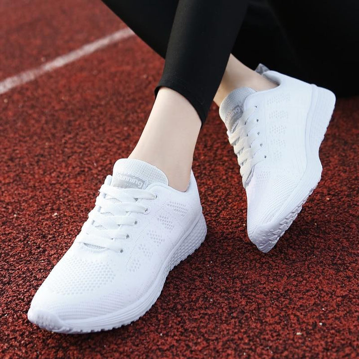 Lace-up women's supportive walking shoes, orthopedic design for foot health & daily relief.