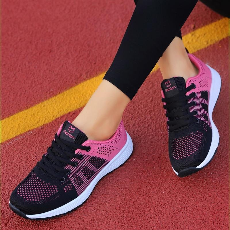 Lace-up orthopedic women's walking shoes, breathable mesh for comfortable foot support.