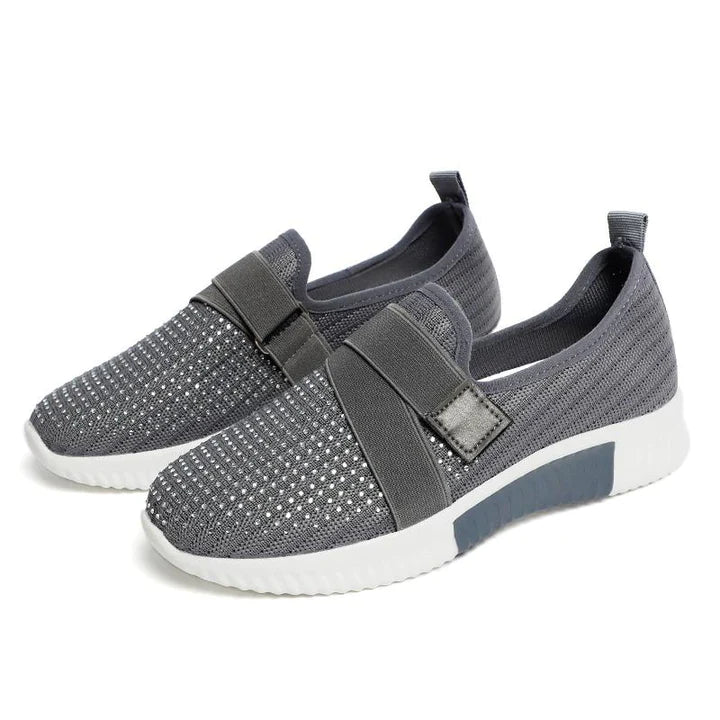 Athletic-style women's slip-on sneakers offering excellent posture & walking support.