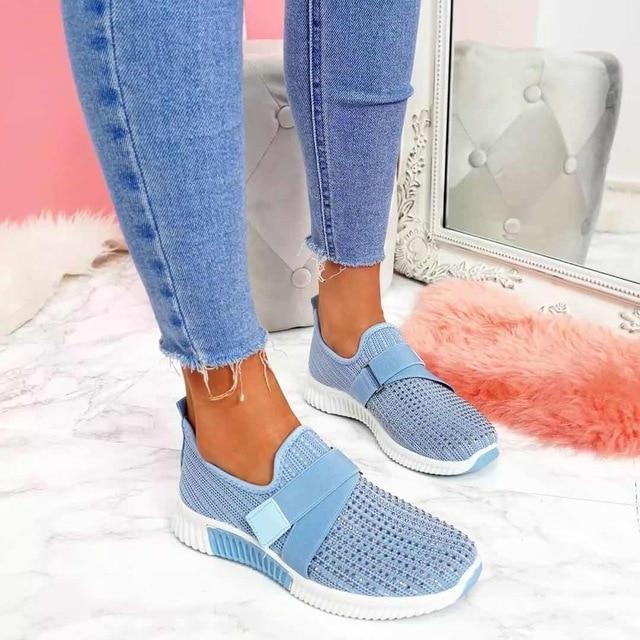Stylish ladies' casual sneakers with innovative posture support and easy slip-on design.