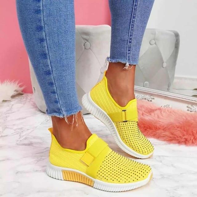 Posture-enhancing slip-on sneakers for women, ideal for effortless daily walking.