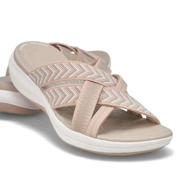 Comfortable women's daily wear sandals with orthopedic arch support and cushioned footbed.