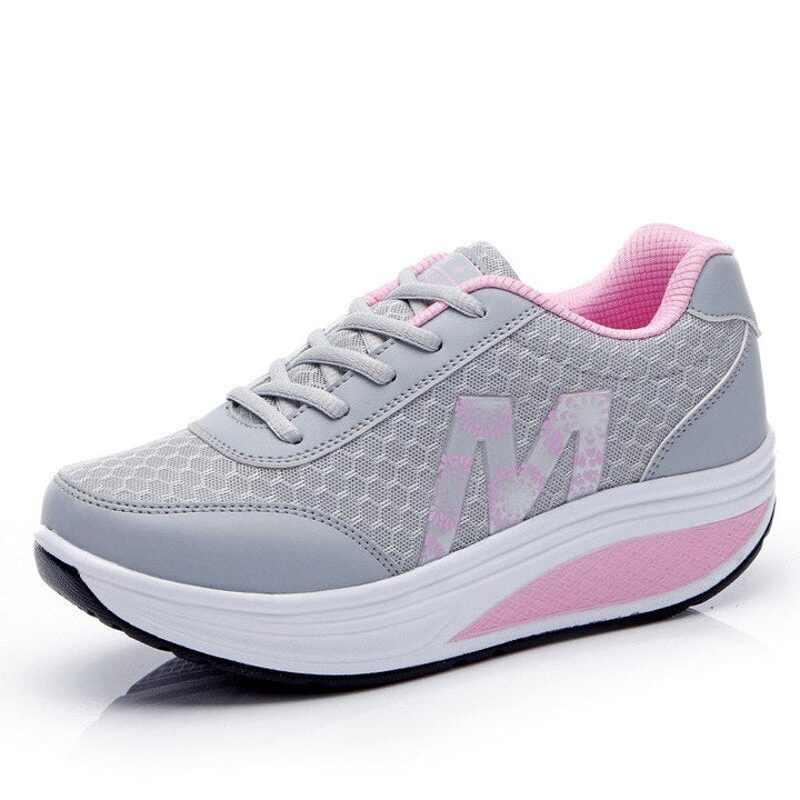 Active women's walking shoes, featuring supportive design and breathable material for comfort.