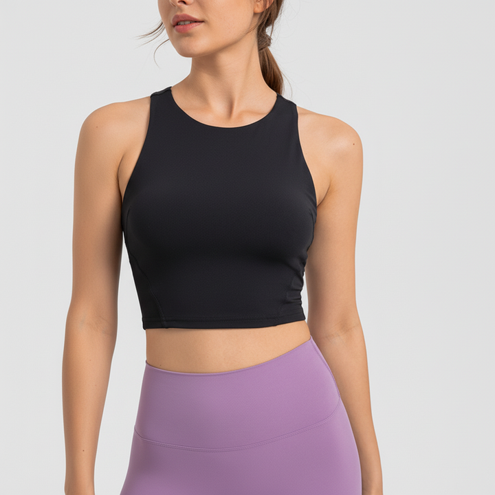 Women's supportive workout top Shirley, with removable pads & stretch fit for active women.