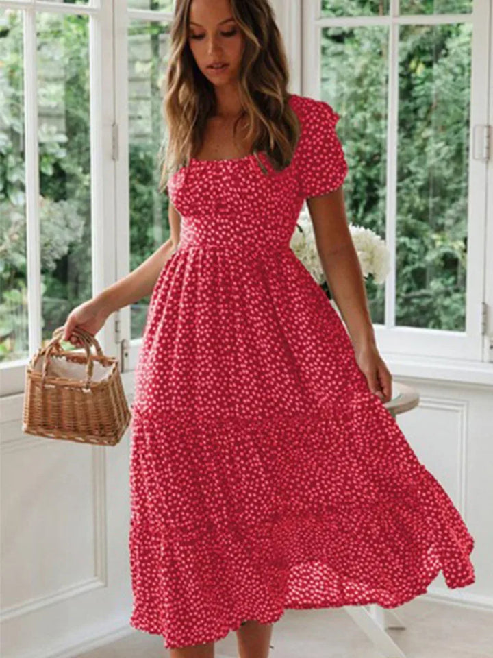 Flowy women's Sweet Meadow floral maxi dress featuring beautiful puff sleeves & a relaxed summer fit.