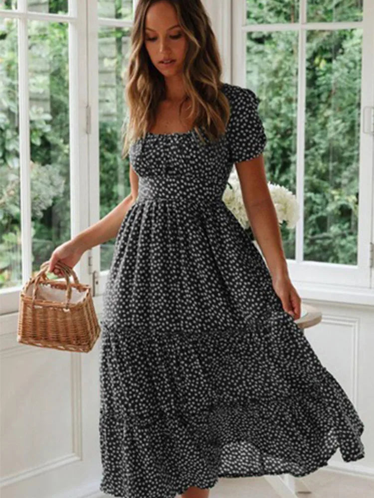 Chic women's floral long dress, a versatile spring/summer maxi with a beautiful meadow print and smocking.