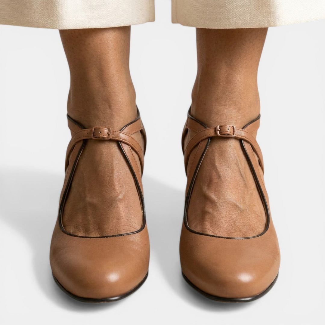 Elegant T-Strap High Heel Sandals for women, featuring a sophisticated round toe and secure buckle.