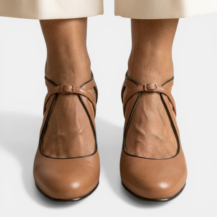 Elegant T-Strap High Heel Sandals for women, featuring a sophisticated round toe and secure buckle.