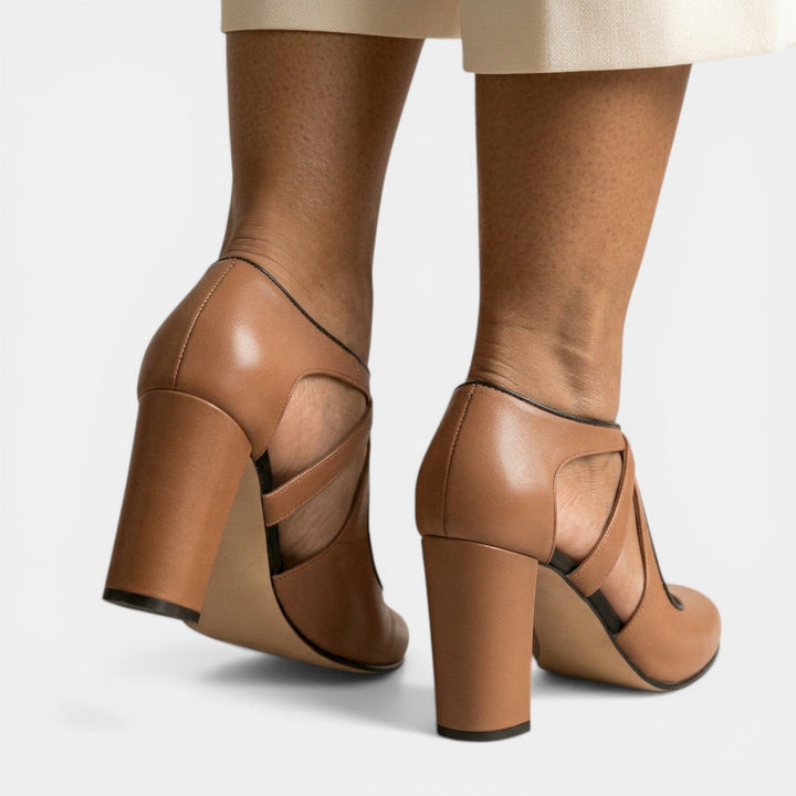 Classic Women's T-Strap High Heels, versatile dress sandals with a round toe and buckle closure.