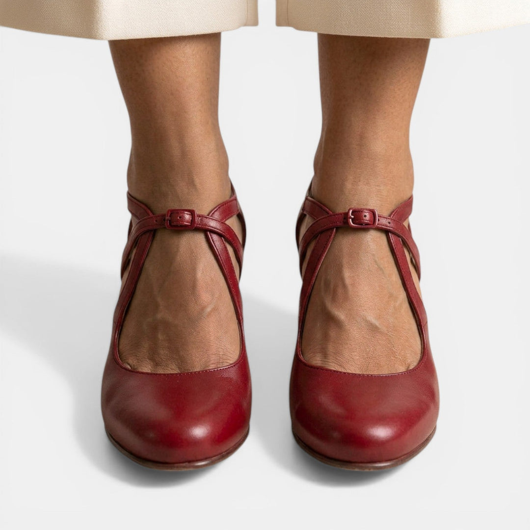 Stylish Women's T-Strap high heel sandals with an elegant round toe, ideal for evening events.