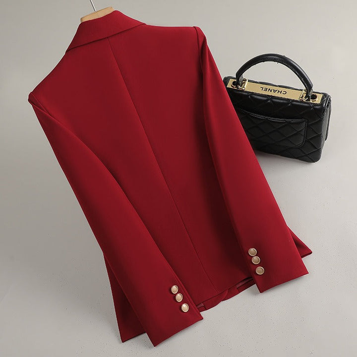 Red women's tailored blazer. Bold fashion statement for business or smart casual office style. Elegant jacket.