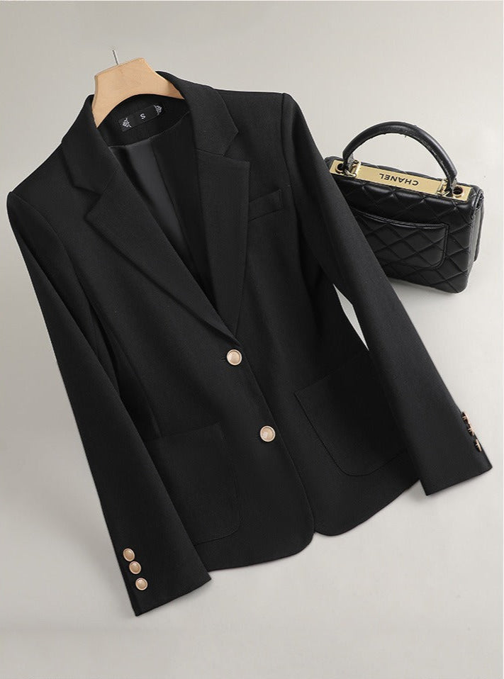 Classic black women's tailored blazer. Essential for professional business attire & sophisticated office style.