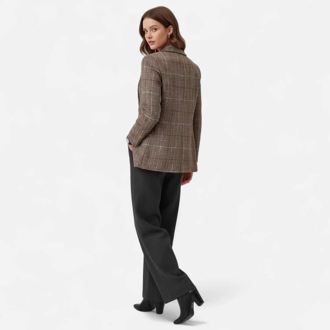 Stylish women's tailored plaid blazer with single-breasted design. Ideal professional work wear or versatile evening jacket.