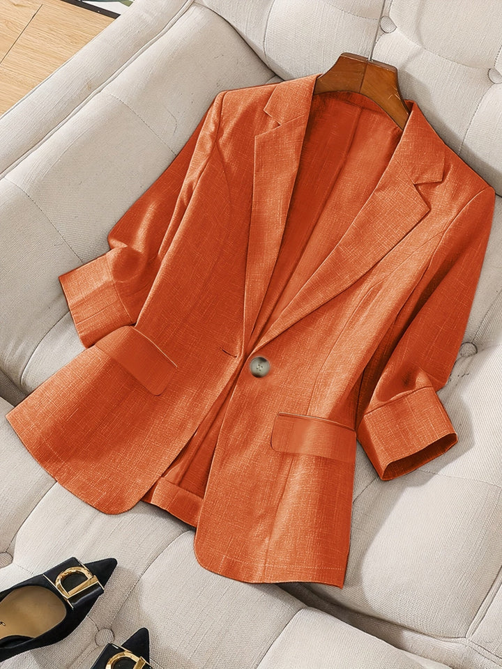 Elegant women's modern cropped jacket, perfect for office wear.