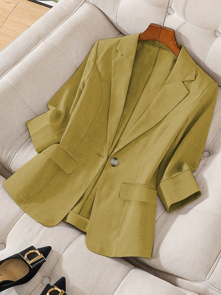 Modern women's business casual blazer, a tailored cropped design.