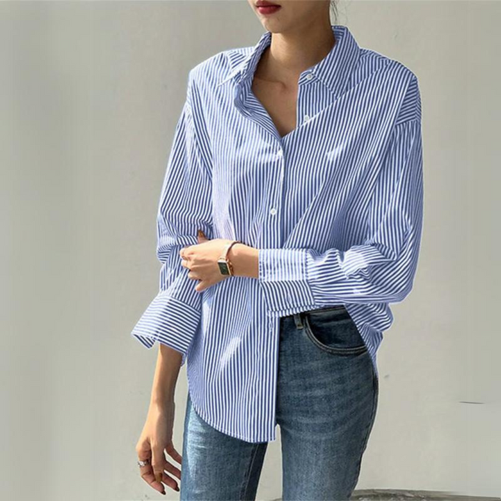 Women's tailored fit executive button-down shirt. Professional office wear for sophisticated business casual style.