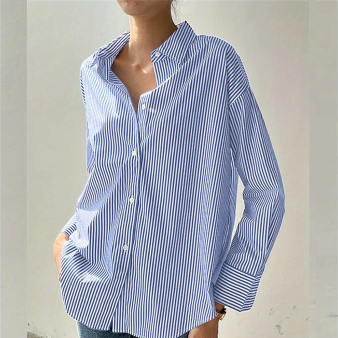 Crisp women's tailored button-down shirt for executive professional apparel. Perfect versatile formal work blouse.
