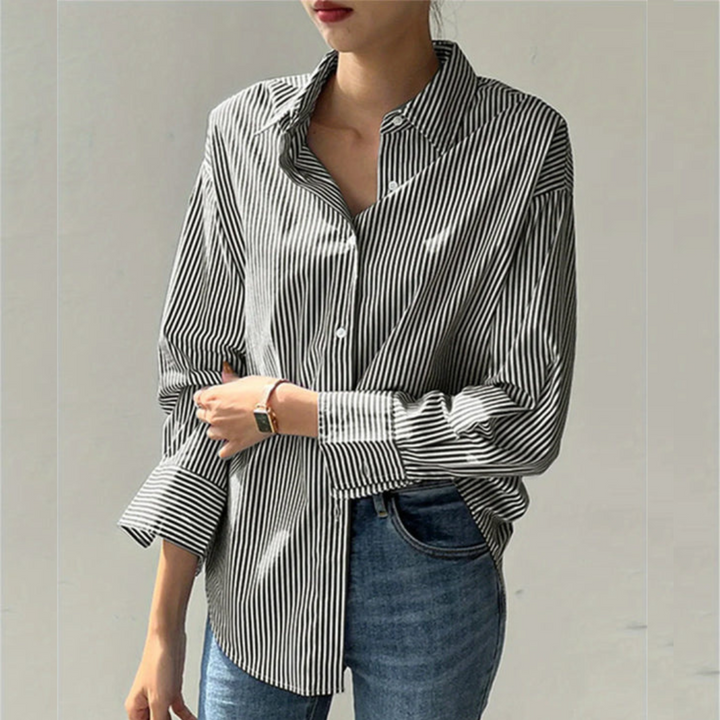 Sophisticated women's tailored fit button-down shirt, perfect for executive wear & comfortable professional style.