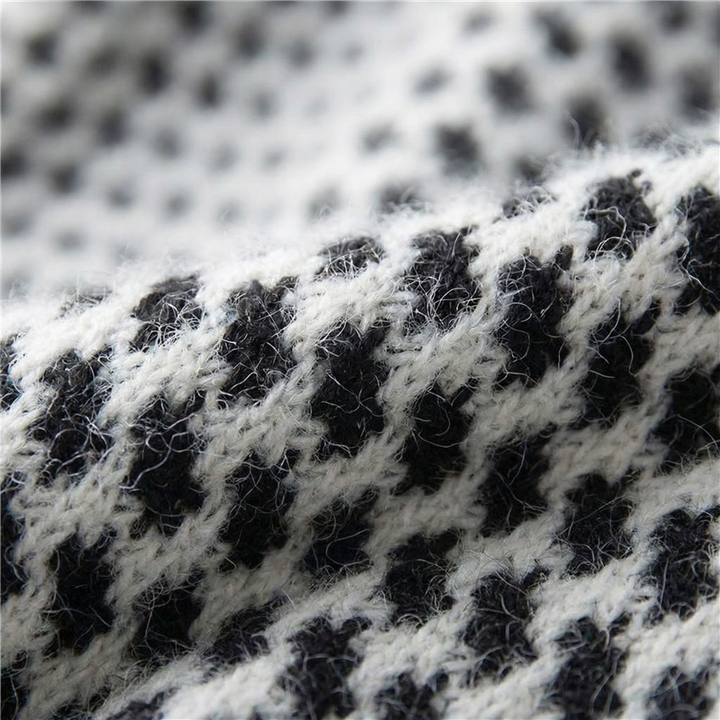 Stylish women's cropped jacket with houndstooth print, perfect for fall fashion.