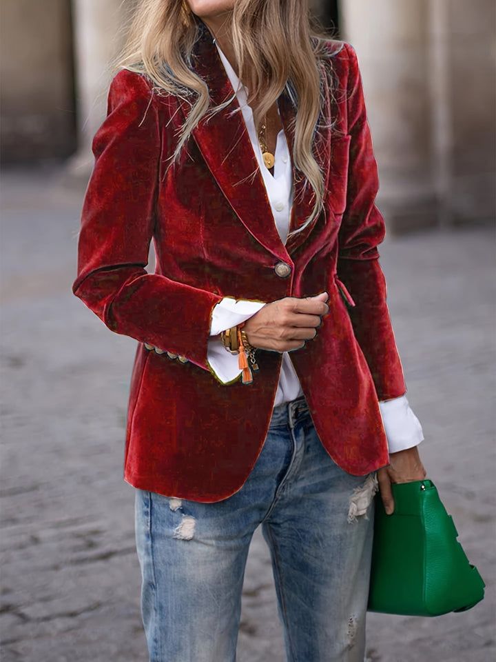Women's tailored velvet blazer with elegant gold buttons, perfect for office or formal wear.