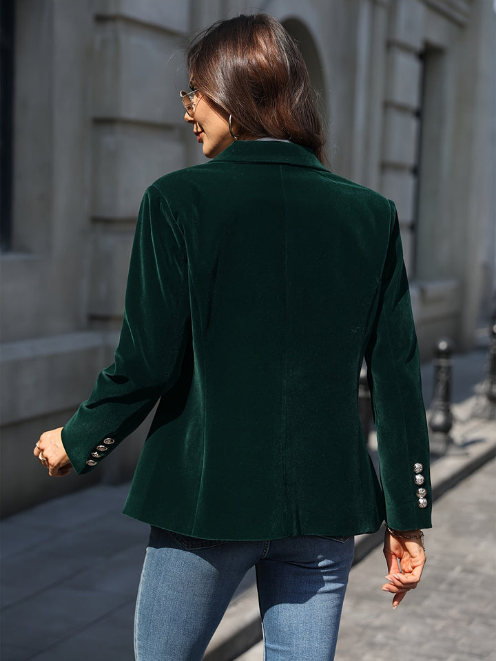 Chic women's tailored velvet blazer with gold buttons, ideal for business casual or elegant outfits.
