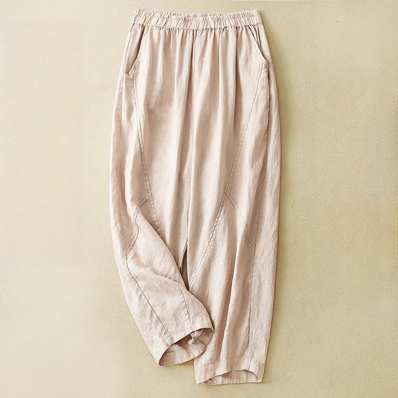 Close-up of women's tapered comfort pants, highlighting the elastic waist and soft, versatile fabric.
