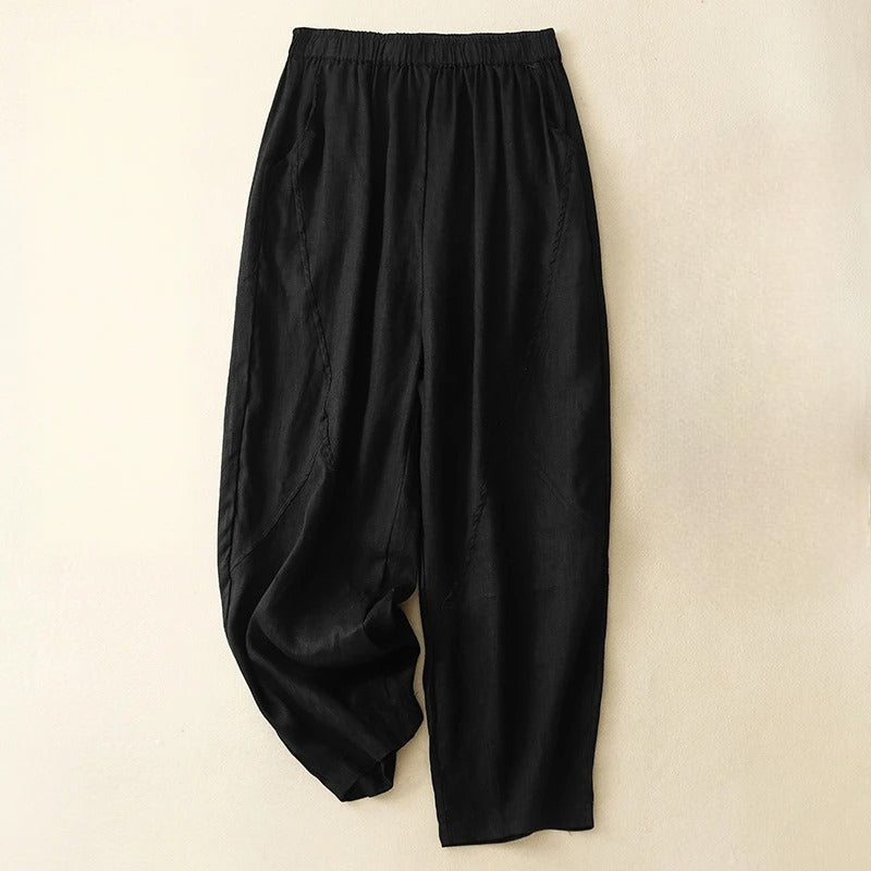 Women's relaxed fit tapered pants with elastic waist, ideal for versatile styling and all-day comfort.