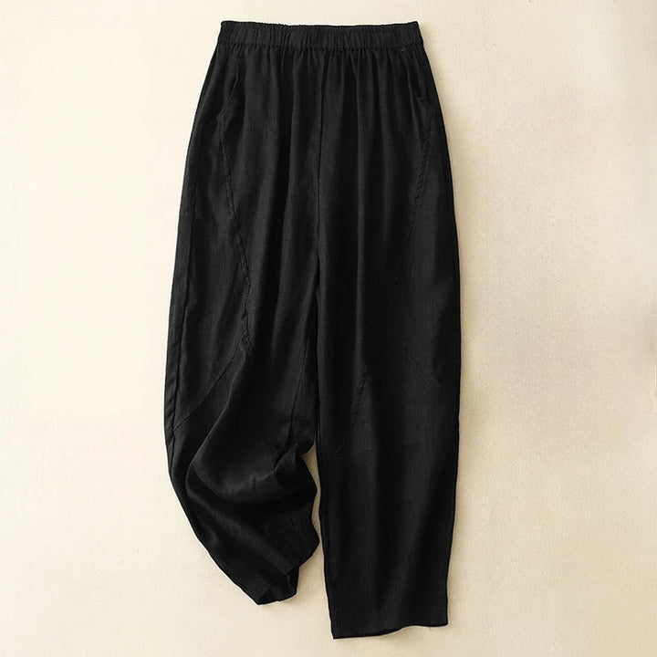 Women's relaxed fit tapered pants with elastic waist, ideal for versatile styling and all-day comfort.