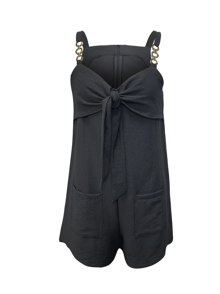 Must-have women's party romper with eye-catching textured design and sleek chain straps.