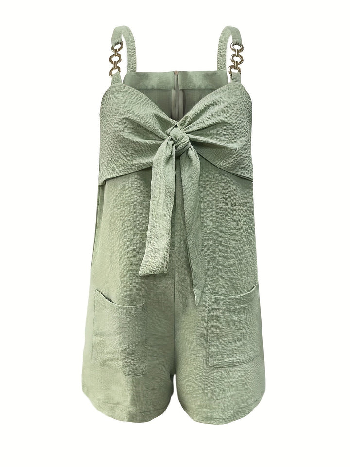 Women's sweetheart neckline romper with chain straps, textured for a distinctive look.