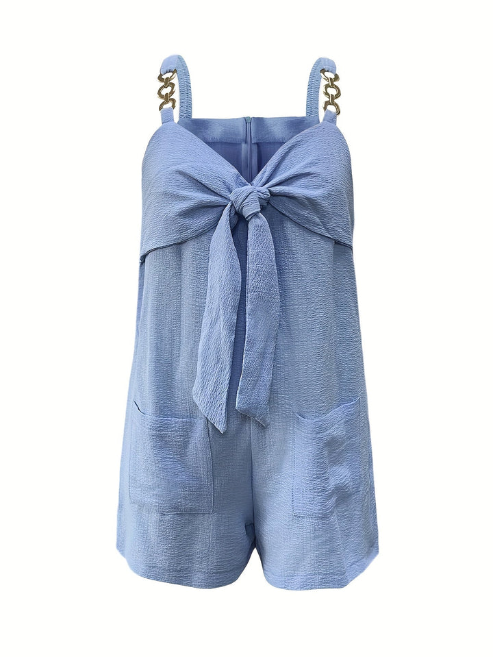 Trendy women's summer romper: textured fabric, cute bow front, & modern chain details.