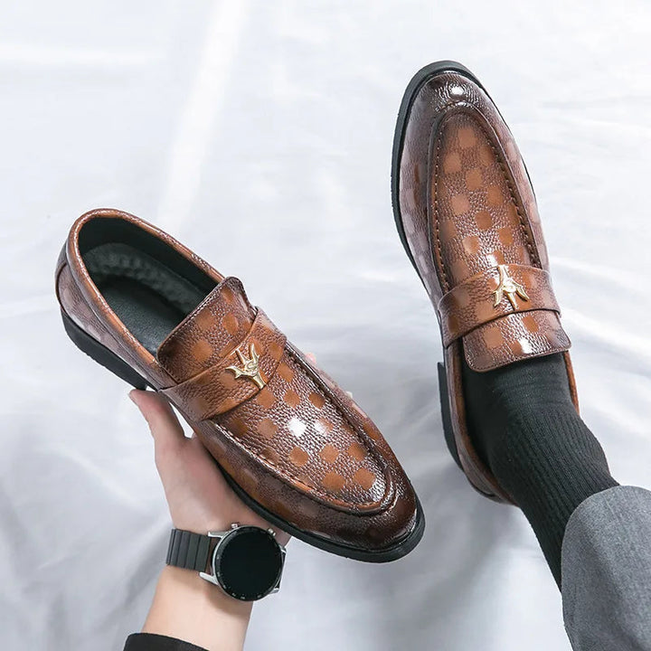 Close-up of elegant textured detailing on women's comfortable slip-on loafers.
