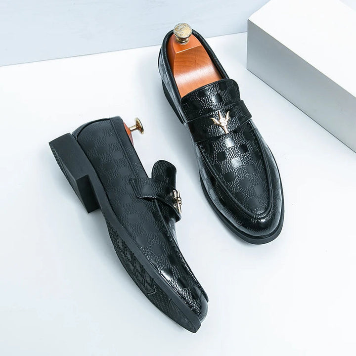 Comfortable women's textured slip-on loafers for stylish everyday wear, classic & versatile.