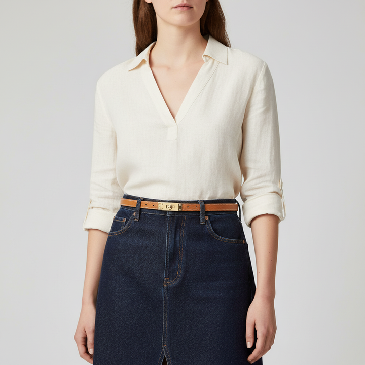 Gray women's leather belt, slim and adjustable, adds a subtle fashion accent to any outfit.