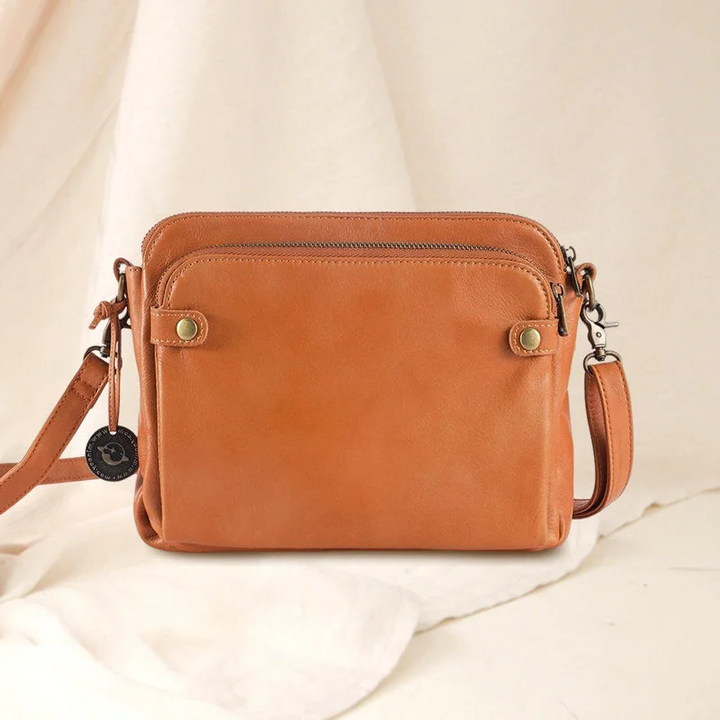 Sophisticated women's PU leather multi-compartment bag: three-layer crossbody, shoulder, & clutch options.