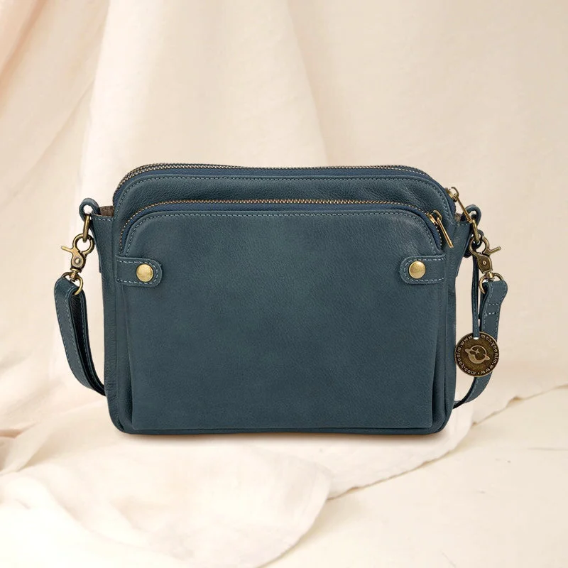 Durable women's PU leather multi-compartment bag. Three-layer design for secure crossbody, shoulder, or clutch wear.