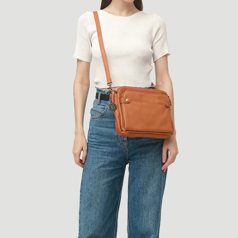 Stylish women's PU leather crossbody shoulder bag & clutch with three secure compartments for daily use.