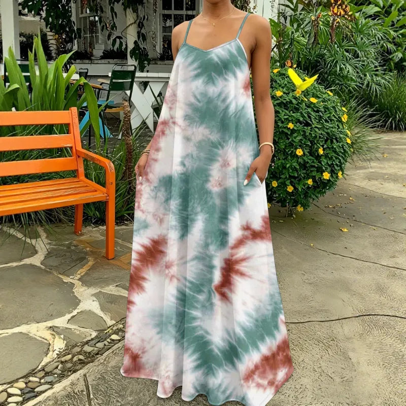 Women's tie-dye strappy maxi dress, perfect for summer. Flowy boho chic style with a V-neck, ideal for vacation.