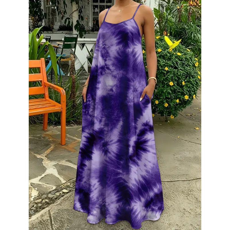Boho chic tie-dye maxi dress for women, featuring a unique pattern. Strappy sleeveless design, perfect for summer beach days.