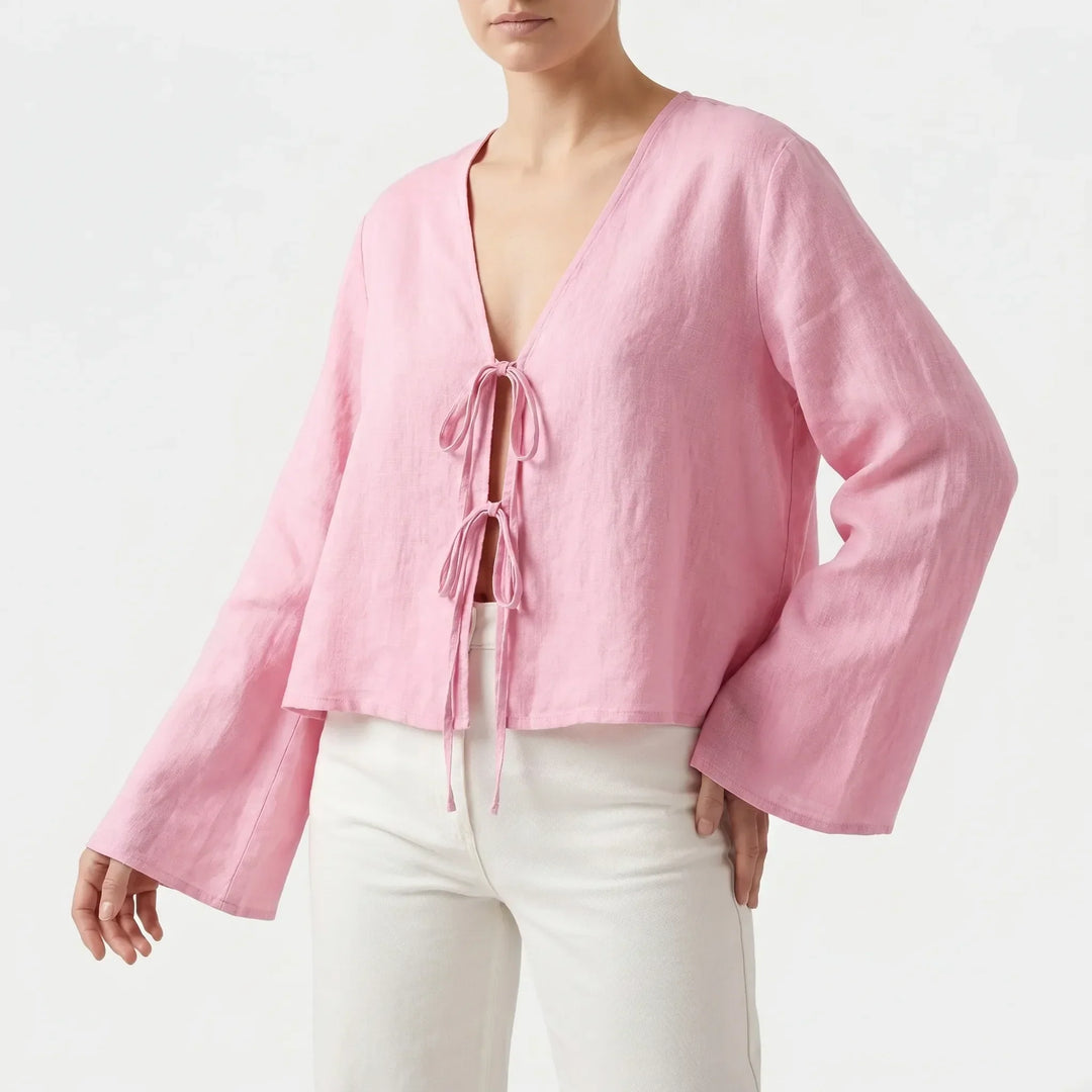 Elegant women's long-sleeve tie-front blouse for warm weather. Casual summer fashion top, relaxed fit style.