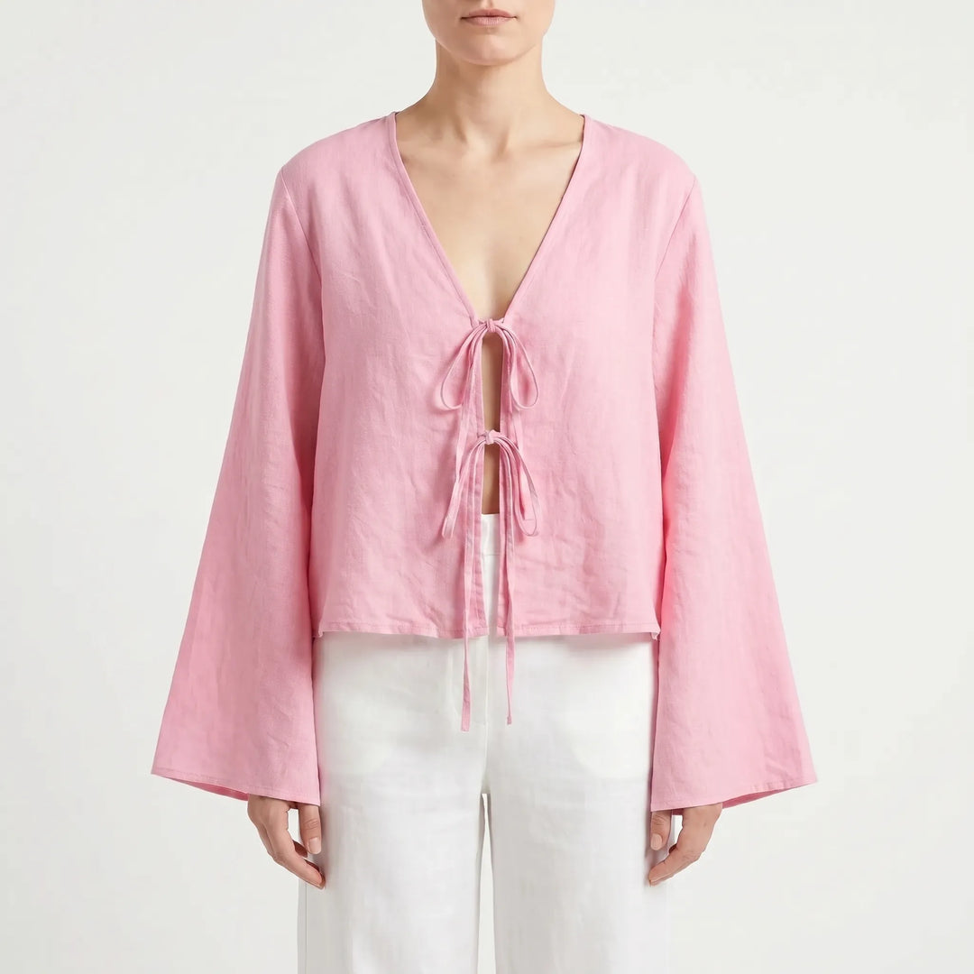 Lightweight women's long-sleeve blouse with front tie. Ideal for comfortable, casual summer fashion and warm weather.