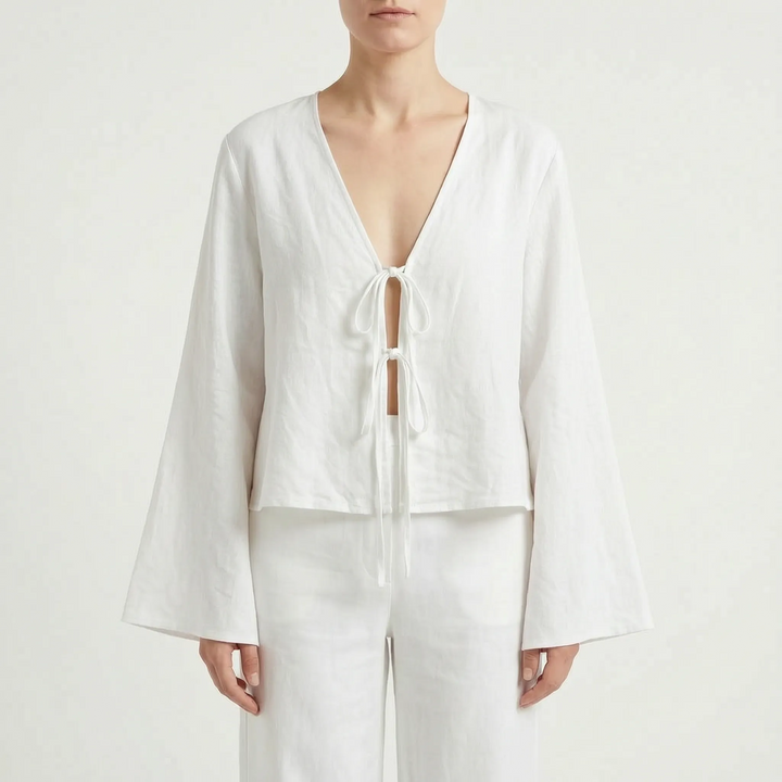 Versatile women's tie-front blouse for summer. A relaxed fit, long-sleeve top, perfect for casual warm weather fashion.