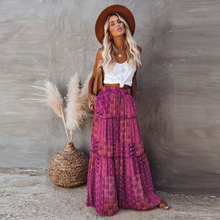 Comfortable women's high elastic waist tiered floral maxi skirt, A-line, casual summer style.